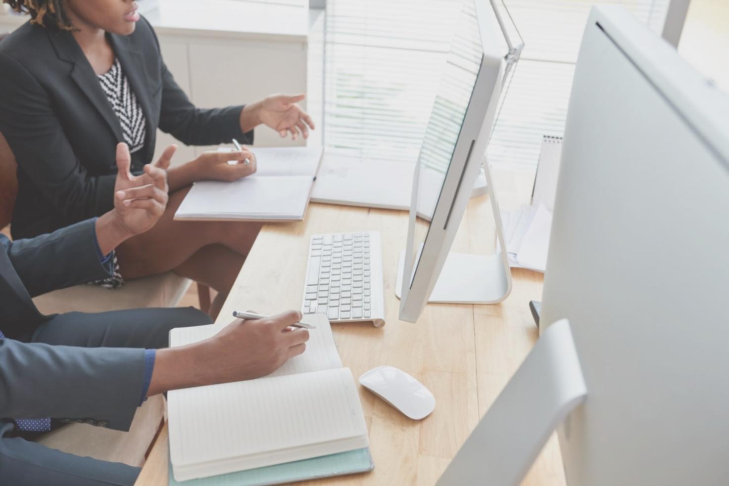 Financial modeling team collaborating on strategic analysis